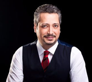 الإعلامي تامر أمين